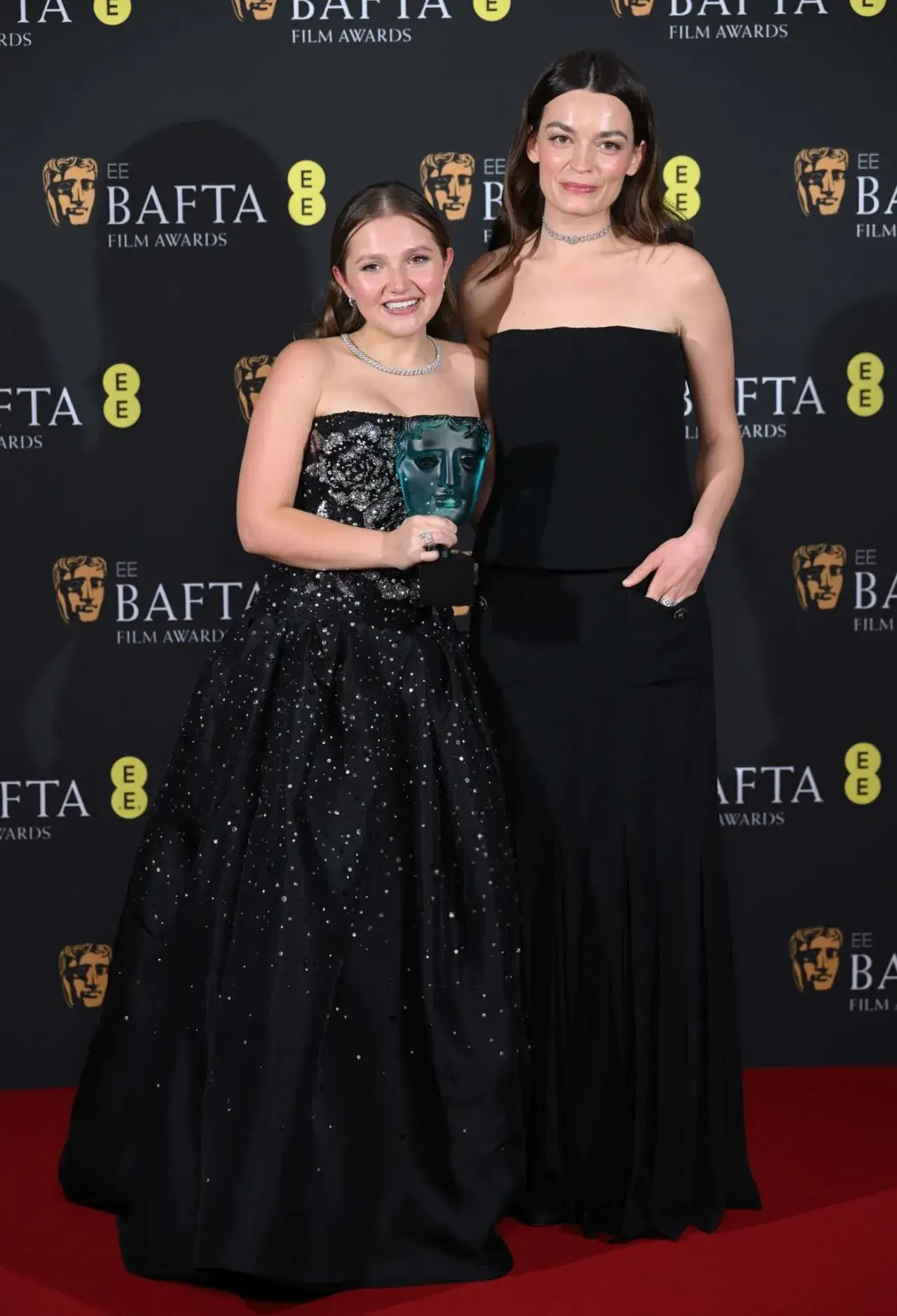 EMMA MACKEY STILLS AT EE BAFTA FILM AWARDS 2024 IN LONDON 7